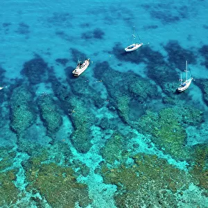 Aerial view of boats and snorkelers, Looe Key Reef, Florida Keys National Marine Sanctuary, USA, showing spur and groove coral formations