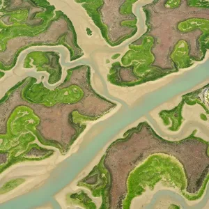 Aerial view of marshes at low tide, Baha de Cdiz Natural Park, Cdiz, Andalusia, Spain Aerial view of marshes at low tide, Baha de Cdiz Natural Park, Cdiz, Andalusia, Spain