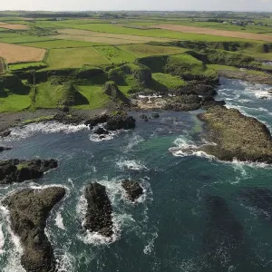 Aerial view to the west of Portbraddan on the north coast of County Antrim