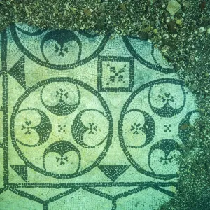 Ancient Roman tessellatum mosaic in black and white decorated with pattern of hexagons, perfectly preserved, in Villa a Protiro. Marine Protected Area of Baia, Naples, Italy. Tyrrhenian sea