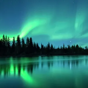 Aurora Borealis (Northern Lights) over the Klondike River, Yukon Territories, Canada, September 2013