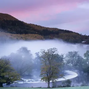 Autumn mist in Dee Valley (Dyffryn Dyfrdwy) at Horseshoe falls, near Llangollen, Denbighshire Autumn mist in Dee Valley (Dyffryn Dyfrdwy) at Horseshoe falls, near Llangollen, Denbighshire