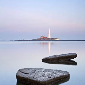 Calm sea with St Marys Lighthouse in distance, Whitley Bay, Tyne and Wear, England