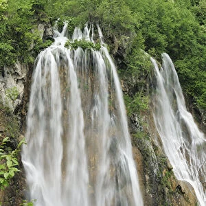 A cascade of waterfalls in woodlands. Plitvice National Park, Croatia, May 2010