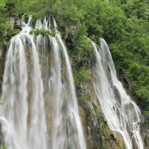 A cascade of waterfalls in woodlands. Plitvice National Park, Croatia, May 2010 A cascade of waterfalls in woodlands. Plitvice National Park, Croatia, May 2010