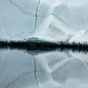 Close up of an iceberg reflected in the water, Ross Sea, Antarctica. January 2000 Close up of an iceberg reflected in the water, Ross Sea, Antarctica. January 2000