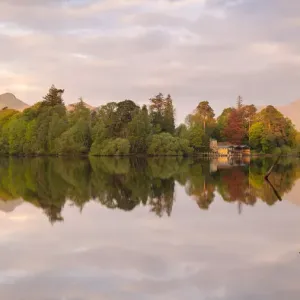 Derwentwater, posts and boathouse, early morning reflections Derwentwater, posts and boathouse, early morning reflections