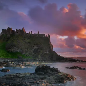 Dunluce Castle at sunset, North Antrim coast, County Antrim, Northern Ireland, UK