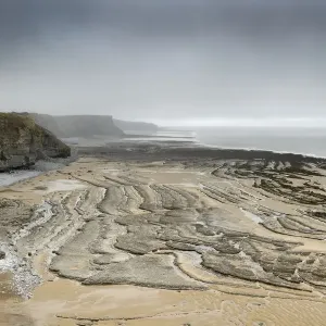 Several faults cutting through Jurassic age, Liassic Limestones (Blue Lias) near Southerndown Several faults cutting through Jurassic age, Liassic Limestones (Blue Lias) near Southerndown