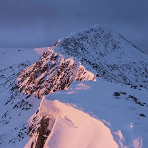 First light on Ben Starav ridge in full winter conditions. Glen Etive, Highlands of Scotland