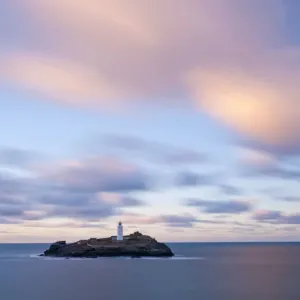 Godrevy Lighthouse in evening light. Gwithian, West Cornwall, UK, January 2011 Godrevy Lighthouse in evening light. Gwithian, West Cornwall, UK, January 2011