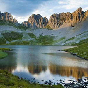 Ibon del Acherito, (Acherito Lake), surrounded by mountain peaks. Anso Valley, Pyrenees