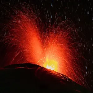 Lava erupting from Reventador volcano at night, El Chaco, Napo, Ecuador. October, 2020 Lava erupting from Reventador volcano at night, El Chaco, Napo, Ecuador. October, 2020