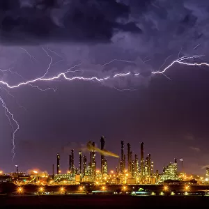 Lightning strike over South Africa's largest coal processing plant. Sasol, Mpumalanga, South Africa, November, 2016