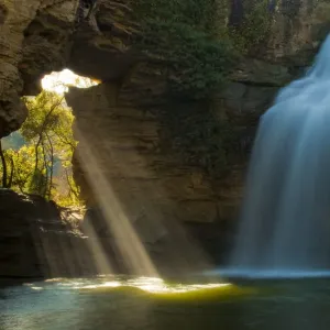Limestone cave and waterfall Print, The Foradada, Spain Limestone cave and waterfall Print, The Foradada, Spain