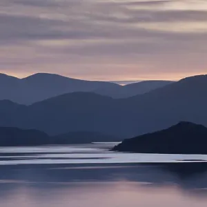 Loch Hope with hills silhouetted at sunset, Loch Hope, Sutherland, Scotland, November 2014 Loch Hope with hills silhouetted at sunset, Loch Hope, Sutherland, Scotland, November 2014