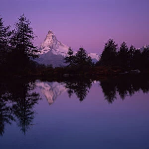 Matterhorn (4, 478m) with reflection in Grindji lake at sunrise, Wallis, Switzerland