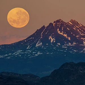 Moonrise over mountain, Torres del Paine National Park, Magallanes, Chile. June, 2022
