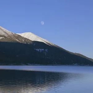 Mountain landscape reflected in lake, Basongcuo National Park, Qinghai-Tibet Plateau