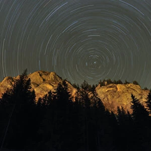 Mountains with star trails in the sky, Cheile Bicazului-Hasmas National Park, Carpathian Mountains