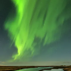 Print of the Northern Lights over a river in Vik, Iceland Print of the Northern Lights over a river in Vik, Iceland