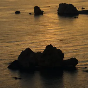 Petra tou Romiou (Aphrodites Rock) at sunset, Pissouri Bay, near Paphos, Cyprus