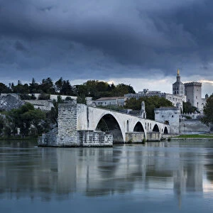 The Pont St-Benezet, Palais des Papes and Rhone River at dusk, Avignon, Provence