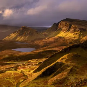The Quiraing in golden morning light, eastern face of Meall na Suiramach The Quiraing in golden morning light, eastern face of Meall na Suiramach
