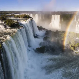 Rainbow over Iguasu Falls, on the Iguasu River, Brazil / Argentina border