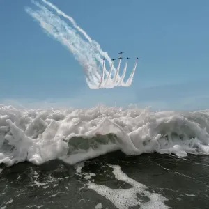 The Red Arrows display team flying in formation over the sea, Rhosneigr, Anglesey, Wales, UK. August, 2022 The Red Arrows display team flying in formation over the sea, Rhosneigr, Anglesey, Wales, UK. August, 2022