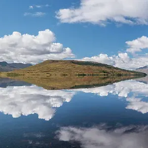 Reflections of clouds and landscape in Loch Arkaig, Glen Dessary, Lochaber, Scotland, UK, September 2016 Reflections of clouds and landscape in Loch Arkaig, Glen Dessary, Lochaber, Scotland, UK, September 2016