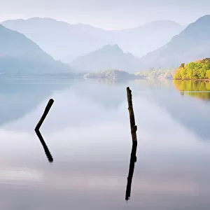 Reflections in Derwent Water in morning light. Keswick, The Lake District, Cumbria, England, UK. May 2019