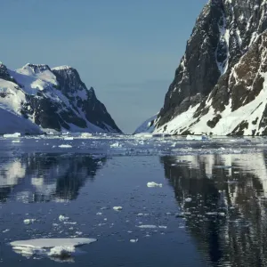 Reflections in Lemaire Channel with brash ice, Antarctica Reflections in Lemaire Channel with brash ice, Antarctica