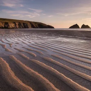 RF- Holywell Bay in evening light and sand ripples, near Newquay, Cornwall, UK. June 2015 RF- Holywell Bay in evening light and sand ripples, near Newquay, Cornwall, UK. June 2015