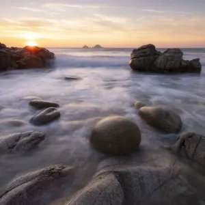 RF - Rocks on Porth Nanven beach at sunset. Cot Valley, near St Just, Cornwall, England RF - Rocks on Porth Nanven beach at sunset. Cot Valley, near St Just, Cornwall, England