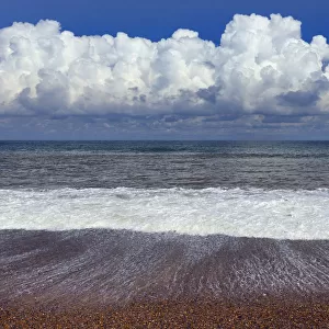 RF- Waves of the North Sea washing onto Weybourne beach, Norfolk, UK. August 2014