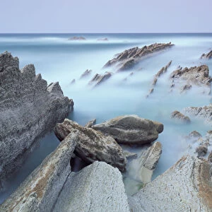 Rock formations on Atxabiribil beach, Basque country, Bay of Biscay, Spain, October 2008