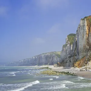 Shingle beach and chalk cliffs along the North Sea coast at Yport, Normandy, France