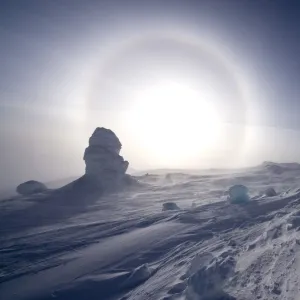 Sundog / Parhelion (circle of light around the sun) with large ice fumerole in the foreground