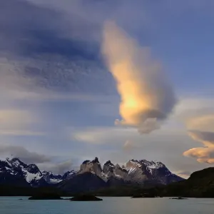 Sunset clouds over Paine mountains, seen from Pehoe Lake, Torres del Paine National Park Sunset clouds over Paine mountains, seen from Pehoe Lake, Torres del Paine National Park