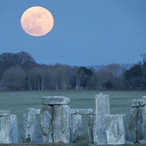 The super blue moon rising over Stonehenge, Wiltshire, England, UK. January 2018