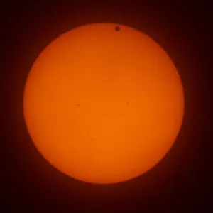 Print of Venus transit across the sun with visible sunspots Print of Venus transit across the sun with visible sunspots