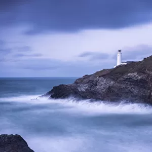Trevose Lighthouse at dusk, long exposure at high tide, Trevose, Cornwall, UK. January 2015