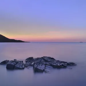 View from Altweary Bay to Melmore Head, Rosguill Peninsula at dusk, County Donegal View from Altweary Bay to Melmore Head, Rosguill Peninsula at dusk, County Donegal