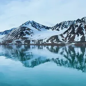 View of coastal mountains, Svalbard, Norway, June 2006