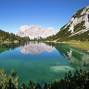 View over Lake Seebensee with Zugspitze and Wetterstein mountains in background, Alps, Tirol, Austria. September, 2020