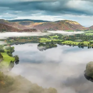 View from Loughrigg, with autumn colour and morning mist over Grasmere, The Lake District, Cumbria, UK. October 2012 View from Loughrigg, with autumn colour and morning mist over Grasmere, The Lake District, Cumbria, UK. October 2012