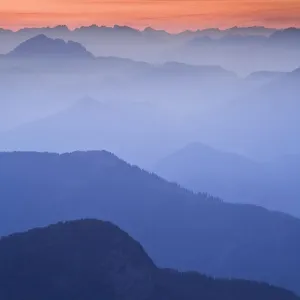 View from the Mangrt Pass at 2000m looking from Slovenia towards Italy at sunset View from the Mangrt Pass at 2000m looking from Slovenia towards Italy at sunset