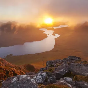View from summit of Cul Beag overlooking Loch Lurgainn and Stac Pollaidh at sunset View from summit of Cul Beag overlooking Loch Lurgainn and Stac Pollaidh at sunset