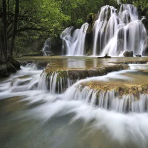 Water flowing over the Cascade des Tufs aux Planches, Arbois, Franche-Comte, France